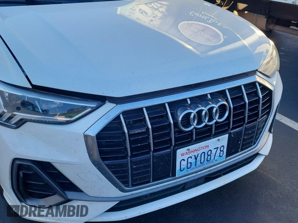 2023 Audi Q3 S line Premium with VIN WA1DECF37P1108975, listed as a IAAI auction lot 42796417 with 58,193 mi miles and . Bid and sale history available at DreamBid. Image 1.