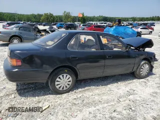 1994 Toyota Camry LE z VIN 4T1SK12E6RU408523, wystawiony jako Copart lot #56314665 z przebiegiem 221 867 mil mil oraz Szkoda całkowita • Salvage title. Historia ofert i sprzedaży dostępna na DreamBid. Obrazek 3.