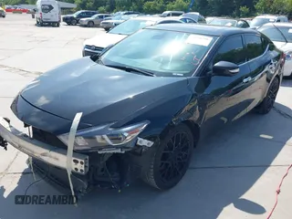 2017 Nissan Maxima SV z VIN 1N4AA6AP5HC399438, wystawiony jako IAAI lot #42436750 z przebiegiem 82 832 mil mil oraz . Historia ofert i sprzedaży dostępna na DreamBid. Obrazek 17.