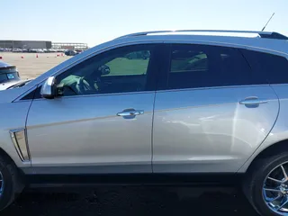2013 Cadillac SRX Premium Collection z VIN 3GYFNEE36DS556446, wystawiony jako IAAI lot #42289824 z przebiegiem 23 988 mil mil oraz . Historia ofert i sprzedaży dostępna na DreamBid. Obrazek 15.