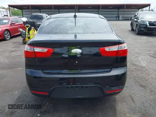 2014 Kia Rio LX with VIN KNADM4A33E6335499, listed as a IAAI auction lot 42123085 with 148,146 mi miles and . Bid and sale history available at DreamBid. Image 16.