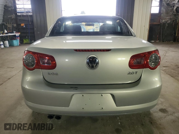 2009 Volkswagen Eos Komfort with VIN WVWBA71F69V019864, listed as a Copart auction lot 52378095 with 142,774 mi miles and Salvage Title. Bid and sale history available at DreamBid. Image 6.