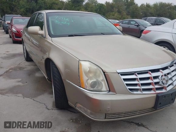 2006 Cadillac DTS 1SC z VIN 1G6KD57Y56U102470, wystawiony jako IAAI lot #40758530 z przebiegiem 149 330 mil mil oraz . Historia ofert i sprzedaży dostępna na DreamBid. Obrazek 1.