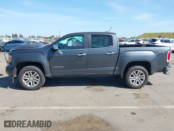 2016 GMC Canyon 4WD SLT with VIN 1GTP6DE15G1323650, listed as a IAAI auction lot 42097101 with 240,662 mi miles. Bid and sale history available at carsss.com. Image 14.