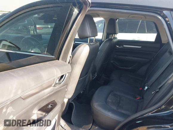 2019 Mazda CX-5 Touring with VIN JM3KFACM6K0533203, listed as a IAAI auction lot 41973125 with 106,882 mi miles and . Bid and sale history available at carsss.com. Image 8.
