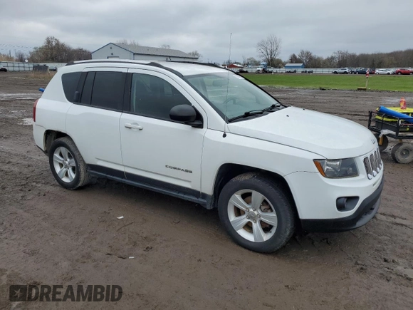 2014 Jeep Compass Sport with VIN 1C4NJDBB9ED641754, listed as a Copart auction lot 52806165 with 76,100 mi miles and Clean Title. Bid and sale history available at carsss.com. Image 4.