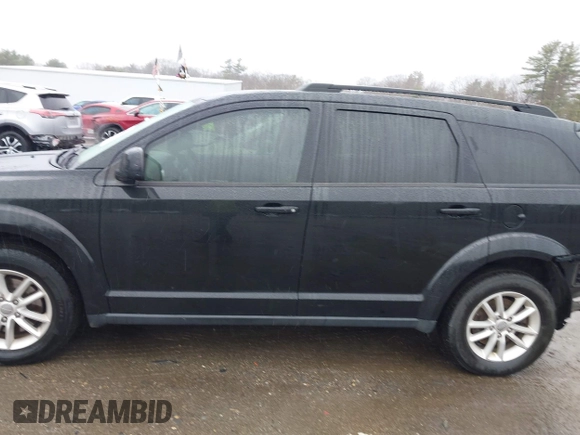 2015 Dodge Journey SXT with VIN 3C4PDDBG5FT639992, listed as a IAAI auction lot 41958496 with 132,410 mi miles and . Bid and sale history available at DreamBid. Image 14.