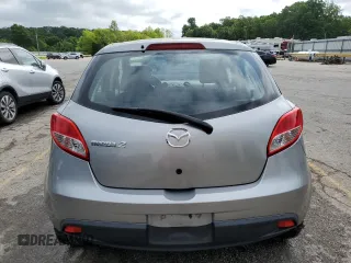 2013 Mazda 2 Sport with VIN JM1DE1KY7D0167585, listed as a Copart auction lot 56028334 with 79,067 mi miles and Salvage Title. Bid and sale history available at carsss.com. Image 6.