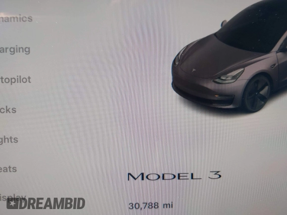 2023 Tesla Model 3 with VIN 5YJ3E1EAXPF405588, listed as a IAAI auction lot 42348952 with 30,788 mi miles and . Bid and sale history available at DreamBid. Image 16.