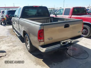 2002 Ford F-150 XL with VIN 1FTRX17242NA02789, listed as a IAAI auction lot 41832186 with 262,253 mi miles. Bid and sale history available at carsss.com. Image 3.