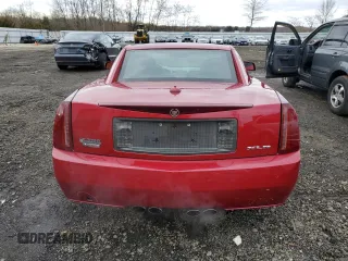 2004 Cadillac XLR z VIN 1G6YV34A845603928, wystawiony jako Copart lot #79260073 z przebiegiem 51 336 mil mil oraz Szkody całkowita. Historia ofert i sprzedaży dostępna na DreamBid. Obrazek 6.