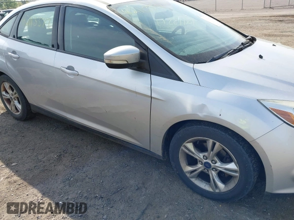 2014 Ford Focus SE with VIN 1FADP3F27EL396785, listed as a IAAI auction lot 42113377 with 147,851 mi miles. Bid and sale history available at carsss.com. Image 6.