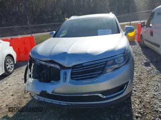 2017 Lincoln MKX Premiere with VIN 2LMPJ6JR3HBL14683, listed as a IAAI auction lot 41143809 with 90,590 mi miles. Bid and sale history available at carsss.com. Image 12.
