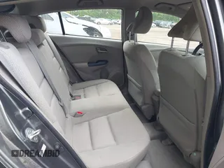 2010 Honda Insight EX with VIN JHMZE2H73AS025856, listed as a IAAI auction lot 42183307 with 71,564 mi miles and . Bid and sale history available at DreamBid. Image 8.