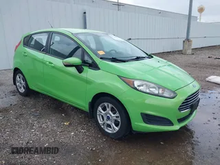 2014 Ford Fiesta SE z VIN 3FADP4EJ8EM233754, wystawiony jako IAAI lot #42108955 z przebiegiem 113 325 mil mil oraz . Historia ofert i sprzedaży dostępna na DreamBid. Obrazek 1.