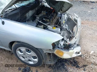 2003 Nissan Sentra XE z VIN 3N1CB51D43L714603, wystawiony jako IAAI lot #42392644 z przebiegiem 201 656 mil mil oraz . Historia ofert i sprzedaży dostępna na DreamBid. Obrazek 15.