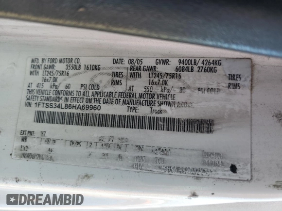 2006 Ford Econoline Cargo with VIN 1FTSS34L86HA69960, listed as a Copart auction lot 76136884 with 302,562 mi miles and Salvage Title. Bid and sale history available at DreamBid. Image 12.