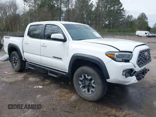 2023 Toyota Tacoma 4WD SR with VIN 3TYCZ5AN7PT125454, listed as a IAAI auction lot 41716476 with 38,767 mi miles. Bid and sale history available at carsss.com. Image 1.