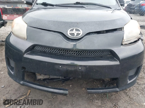 2010 Scion xD with VIN JTKKU4B45AJ058839, listed as a IAAI auction lot 41708936 with 214,685 mi miles. Bid and sale history available at carsss.com. Image 6.