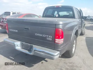 2003 Dodge Dakota SLT with VIN 1D7HL48N23S247441, listed as a IAAI auction lot 41359296 with 58,414 mi miles. Bid and sale history available at carsss.com. Image 4.