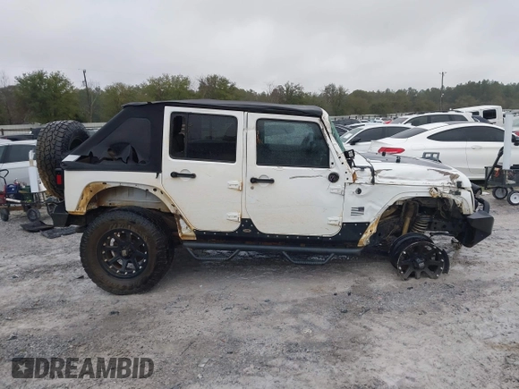 2014 Jeep Wrangler Unlimited Sahara with VIN 1C4BJWEG0EL151473, listed as a IAAI auction lot 41600726 with 119,057 mi miles. Bid and sale history available at carsss.com. Image 13.
