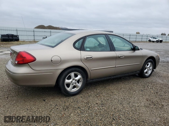 2003 Ford Taurus SE Standard with VIN 1FAFP53U03A252904, listed as a Copart auction lot 82175794 with 156,490 mi miles and Salvage Title. Bid and sale history available at carsss.com. Image 3.