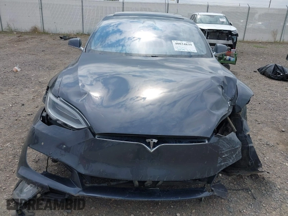 2019 Tesla Model S 75D with VIN 5YJSA1E22KF300407, listed as a IAAI auction lot 40034839 with 59,178 mi miles and . Bid and sale history available at DreamBid. Image 6.