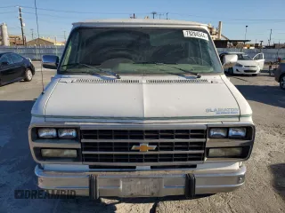 1994 Chevrolet Chevy Van z VIN 1GBEG25K9RF182710, wystawiony jako Copart lot #79284544 z przebiegiem 178 640 mil mil oraz Czysty tytuł • Clean title. Historia ofert i sprzedaży dostępna na DreamBid. Obrazek 5.