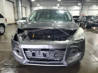 2015 Ford Escape Titanium with VIN 1FMCU9J90FUA26808, listed as a Copart auction lot 54449805 with 184,576 mi miles and Salvage title. Bid and sale history available at DreamBid. Image 5.