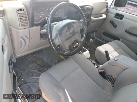 2003 Jeep Wrangler Sahara with VIN 1J4FA59S73P312279, listed as a Copart auction lot 60230445 with 151,886 mi miles and Clean title. Bid and sale history available at DreamBid. Image 8.