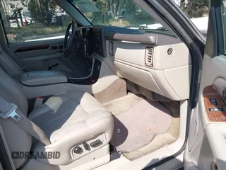 2002 Cadillac Escalade z VIN 1GYEC63T82R138951, wystawiony jako IAAI lot #42164804 z przebiegiem 265 812 mil mil oraz . Historia ofert i sprzedaży dostępna na DreamBid. Obrazek 5.