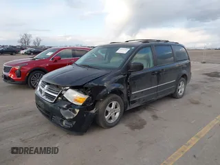 2008 Dodge Grand Caravan SXT with VIN 2D8HN54P48R827298, listed as a IAAI auction lot 41972302 with 199,903 mi miles and . Bid and sale history available at DreamBid. Image 2.