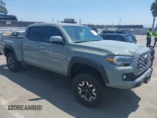 2023 Toyota Tacoma SR5 z VIN 3TMDZ5BN3PM156120, wystawiony jako IAAI lot #42100938 z przebiegiem 8 412 mil mil oraz . Historia ofert i sprzedaży dostępna na DreamBid. Obrazek 1.