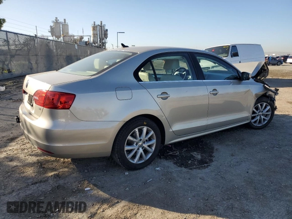 2014 Volkswagen Jetta SE with VIN 3VWD17AJ2EM240795, listed as a Copart auction lot 49749455 with 73,389 mi miles and Salvage title. Bid and sale history available at DreamBid. Image 3.