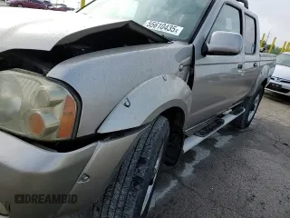 2004 Nissan Frontier LE z VIN 1N6ED27T14C460890, wystawiony jako Copart lot #55610435 z przebiegiem 218 988 mil mil oraz Szkoda całkowita • Salvage title. Historia ofert i sprzedaży dostępna na DreamBid. Obrazek 13.