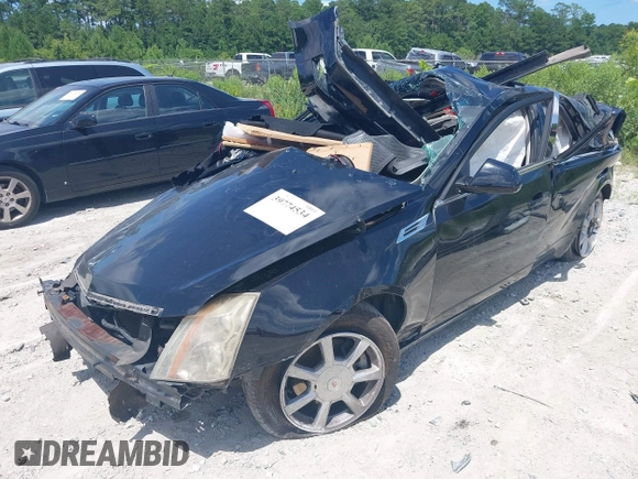 2008 Cadillac CTS RWD with VIN 1G6DF577080143965, listed as a IAAI auction lot 39774534 with 154,289 mi miles and . Bid and sale history available at DreamBid. Image 2.
