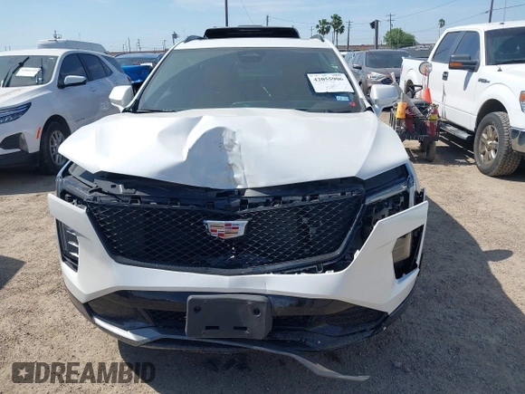 2024 Cadillac XT4 FWD Sport with VIN 1GYFZER43RF133293, listed as a IAAI auction lot 42055906 with 25,398 mi miles and . Bid and sale history available at DreamBid. Image 12.