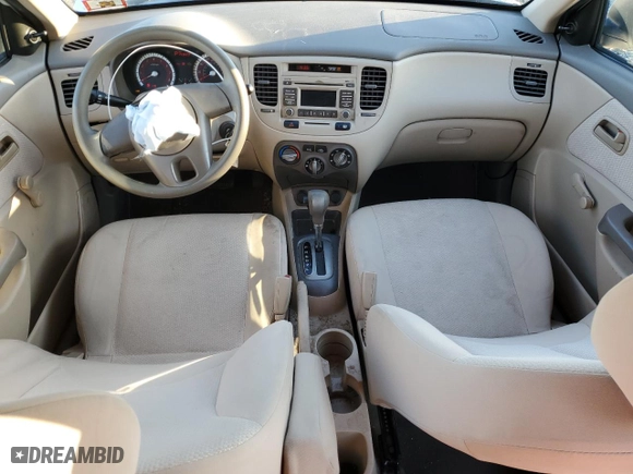 2010 Kia Rio LX with VIN KNADH4A3XA6624135, listed as a Copart auction lot 45455745 with 143,623 mi miles and Salvage Title. Bid and sale history available at carsss.com. Image 8.