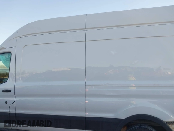 2020 Ford Transit Cargo with VIN 1FTBR1X82LKB80557, listed as a IAAI auction lot 41217513 with 89,774 mi miles and . Bid and sale history available at DreamBid. Image 15.