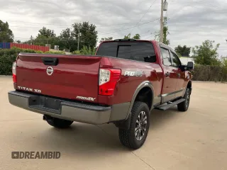 2016 Nissan Titan Pro-4X z VIN 1N6BA1F40GN516889, wystawiony jako Copart lot #72827234 z przebiegiem 123 706 mil mil oraz Czysty tytuł • Clean title. Historia ofert i sprzedaży dostępna na DreamBid. Obrazek 4.