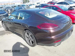2015 Porsche Panamera 4 z VIN WP0AA2A76FL000746, wystawiony jako IAAI lot #41411279 z przebiegiem 37 496 mil mil oraz . Historia ofert i sprzedaży dostępna na DreamBid. Obrazek 3.