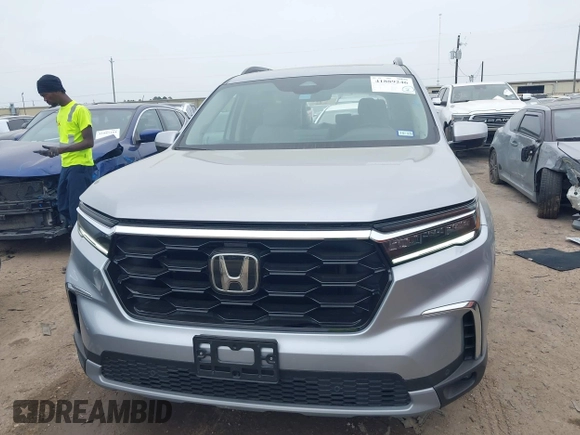 2023 Honda Pilot Touring with VIN 5FNYG2H75PB014662, listed as a IAAI auction lot 41889246 with 14,413 mi miles. Bid and sale history available at carsss.com. Image 12.
