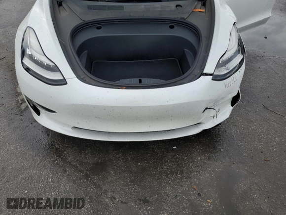 2021 Tesla Model 3 Standard Range Plus z VIN 5YJ3E1EA2MF859832, wystawiony jako Copart lot #56743865 z przebiegiem 77 025 mil mil oraz Nie do naprawy. Historia ofert i sprzedaży dostępna na DreamBid. Obrazek 11.