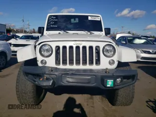 2018 Jeep Wrangler JK Unlimited Sport S with VIN 1C4BJWDG2JL913150, listed as a Copart auction lot 79956974 with 86,153 mi miles and Salvage Title. Bid and sale history available at carsss.com. Image 5.