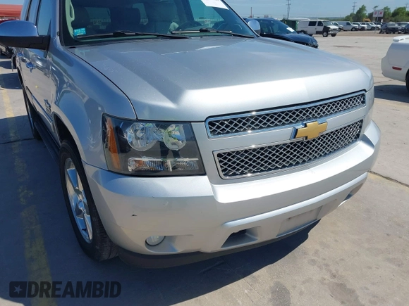 2013 Chevrolet Tahoe LT with VIN 1GNSCBE07DR164486, listed as a IAAI auction lot 42216421 with 220,395 mi miles and . Bid and sale history available at DreamBid. Image 6.