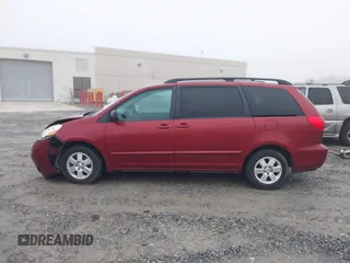 2010 Toyota Sienna CE with VIN 5TDKK4CCXAS318352, listed as a IAAI auction lot 41909416 with 228,041 mi miles. Bid and sale history available at carsss.com. Image 15.