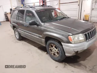 2000 Jeep Grand Cherokee Laredo z VIN 1J4GW48S1YC277710, wystawiony jako IAAI lot #42033564 z przebiegiem Nie podano mil oraz . Historia ofert i sprzedaży dostępna na DreamBid. Obrazek 1.