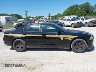 2014 Dodge Charger Police with VIN 2C3CDXAT1EH367015, listed as a IAAI auction lot 42136195 with 121,536 mi miles and . Bid and sale history available at DreamBid. Image 13.