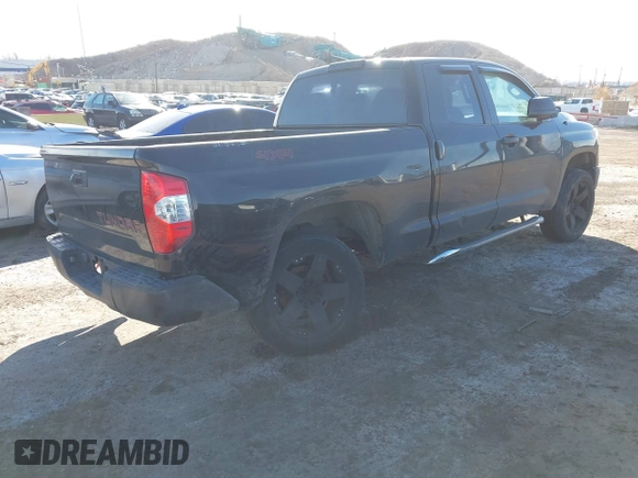 2016 Toyota Tundra 4WD Truck SR with VIN 5TFUM5F16GX064418, listed as a IAAI auction lot 41504912 with 215,241 mi miles. Bid and sale history available at carsss.com. Image 4.