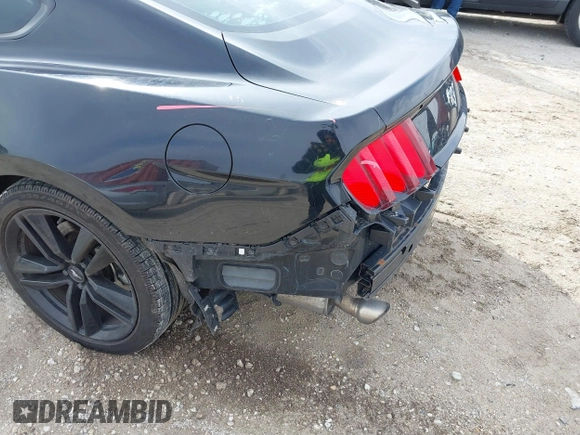 2017 Ford Mustang EcoBoost z VIN 1FA6P8TH3H5351723, wystawiony jako IAAI lot #41883990 z przebiegiem 120 520 mil mil oraz . Historia ofert i sprzedaży dostępna na DreamBid. Obrazek 18.